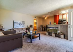 Fairview St. property interior photo of living room, dining and kitchen